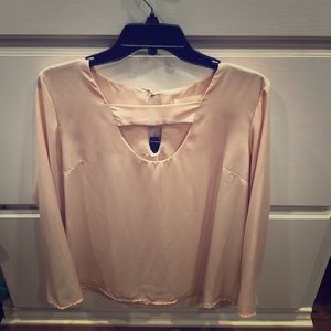 Cream blouse with cut out front and keyhole back